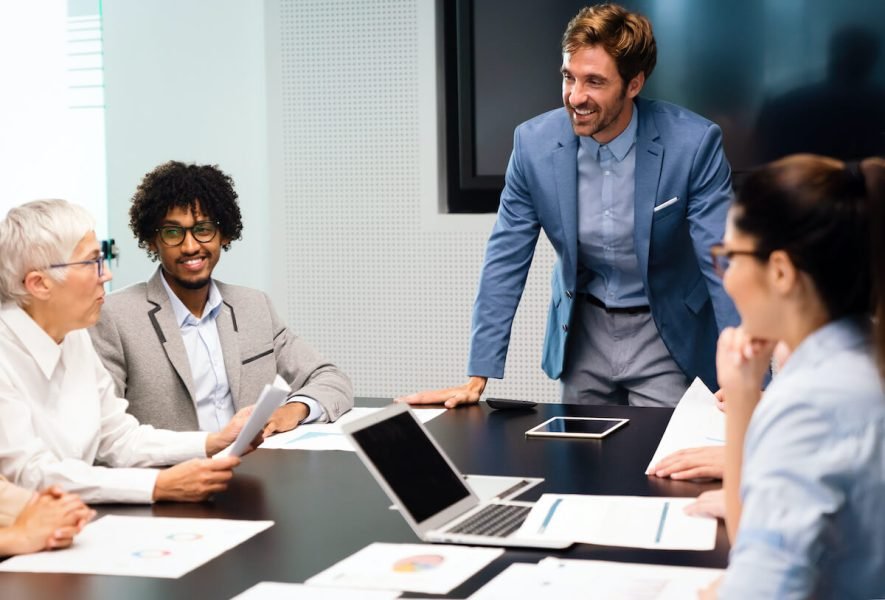 portrait-of-successful-business-team-working-in-of-2023-11-27-05-03-34-utc.jpg